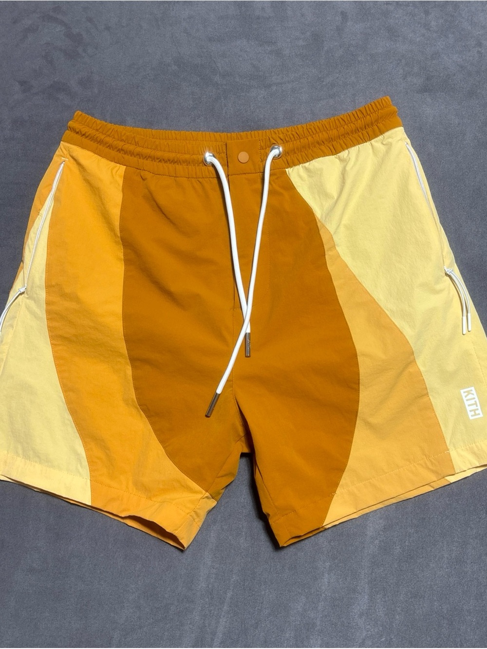 Kith Curved Colorblock Orange & Yellow Swim Shorts
